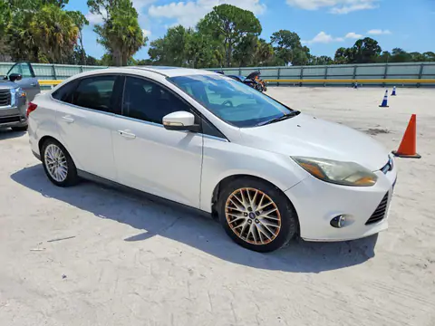 1FADP3J21EL240653 — 2014 Ford Focus, photo 4 from Аукцион 21.10.2026, Minor dents and scratches