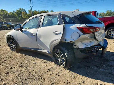 JM1DKFC75J1305626 — 2018 Mazda CX-3, фото 2 з Аукцион 23.10.2026, Задня частина