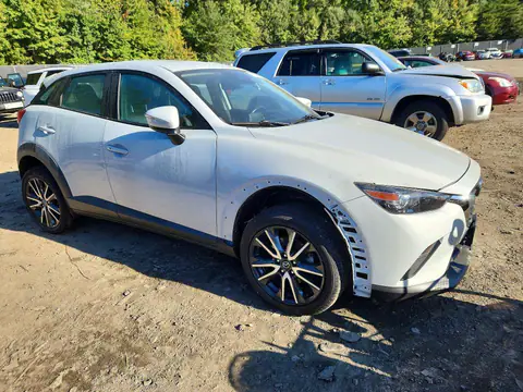 JM1DKFC75J1305626 — 2018 Mazda CX-3, фото 4 з Аукцион 23.10.2026, Задня частина