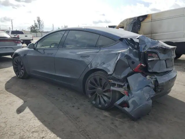 5YJ3E1EC7NF328869 — 2022 Tesla Model 3, photo 2 from Аукцион 19.10.2026, Rear end