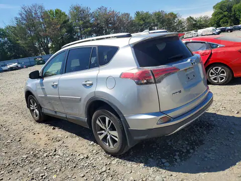 JTMRFREV4JJ216282 — 2018 Toyota RAV4, photo 2 from Аукцион 21.10.2026, Side